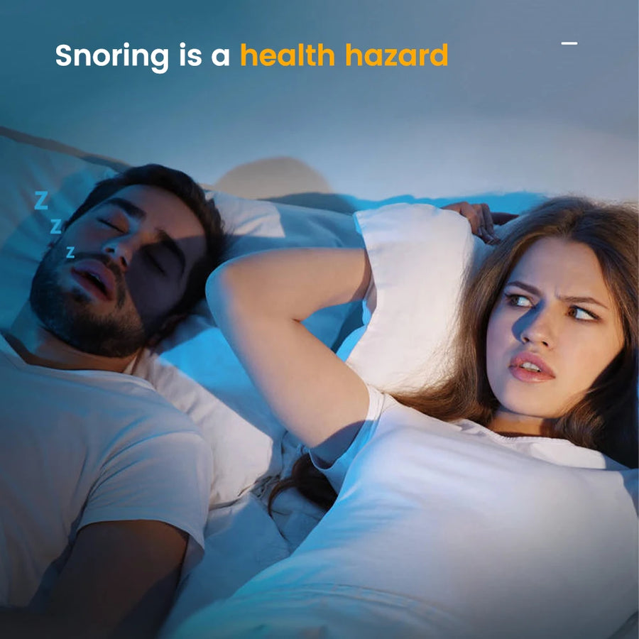 Woman covering her ears beside a man snoring in bed