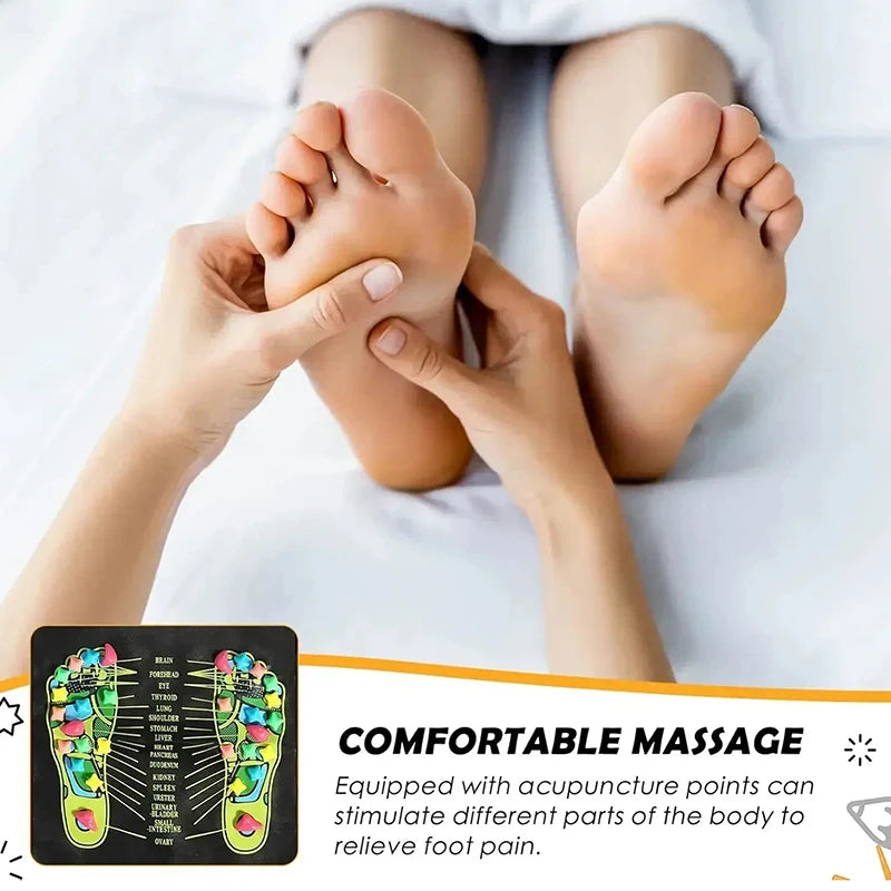 Hands massaging a bare foot, with the mat's printed foot chart